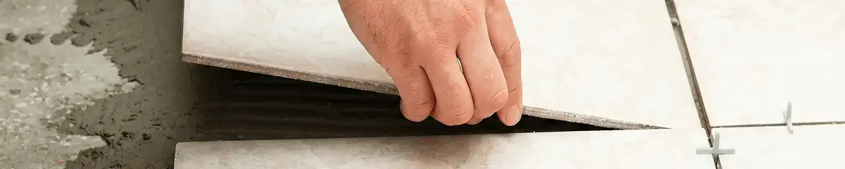 Professional installing ceramic tile floors in Lakewood, CO