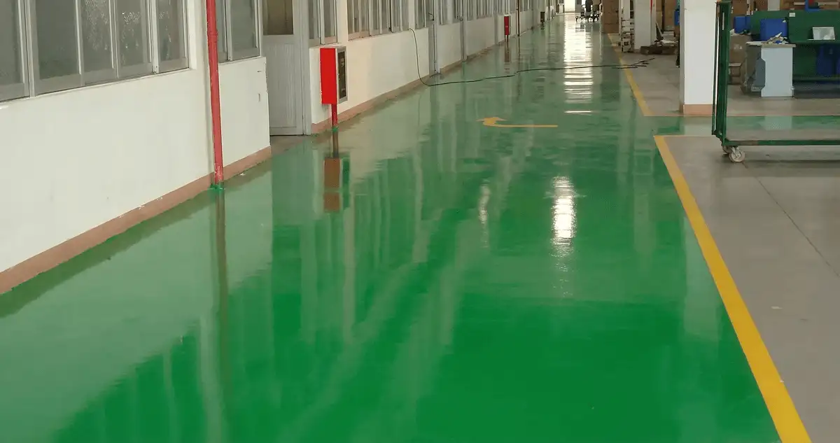 A factory floor professionally covered and marked with epoxy flooring in Lakewood, CO