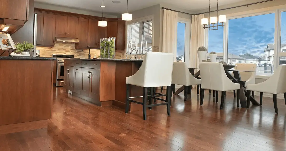 A modern kitchen with professionally installed wood flooring in Lakewood, CO